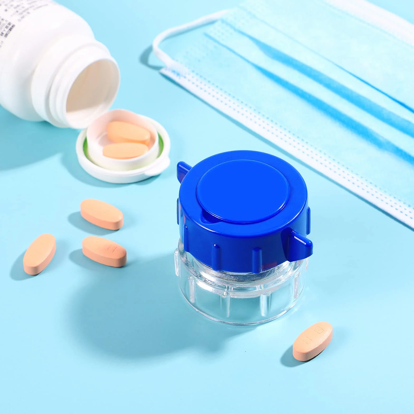 Tritapillole con contenitore in plastica multifunzione portatile blu