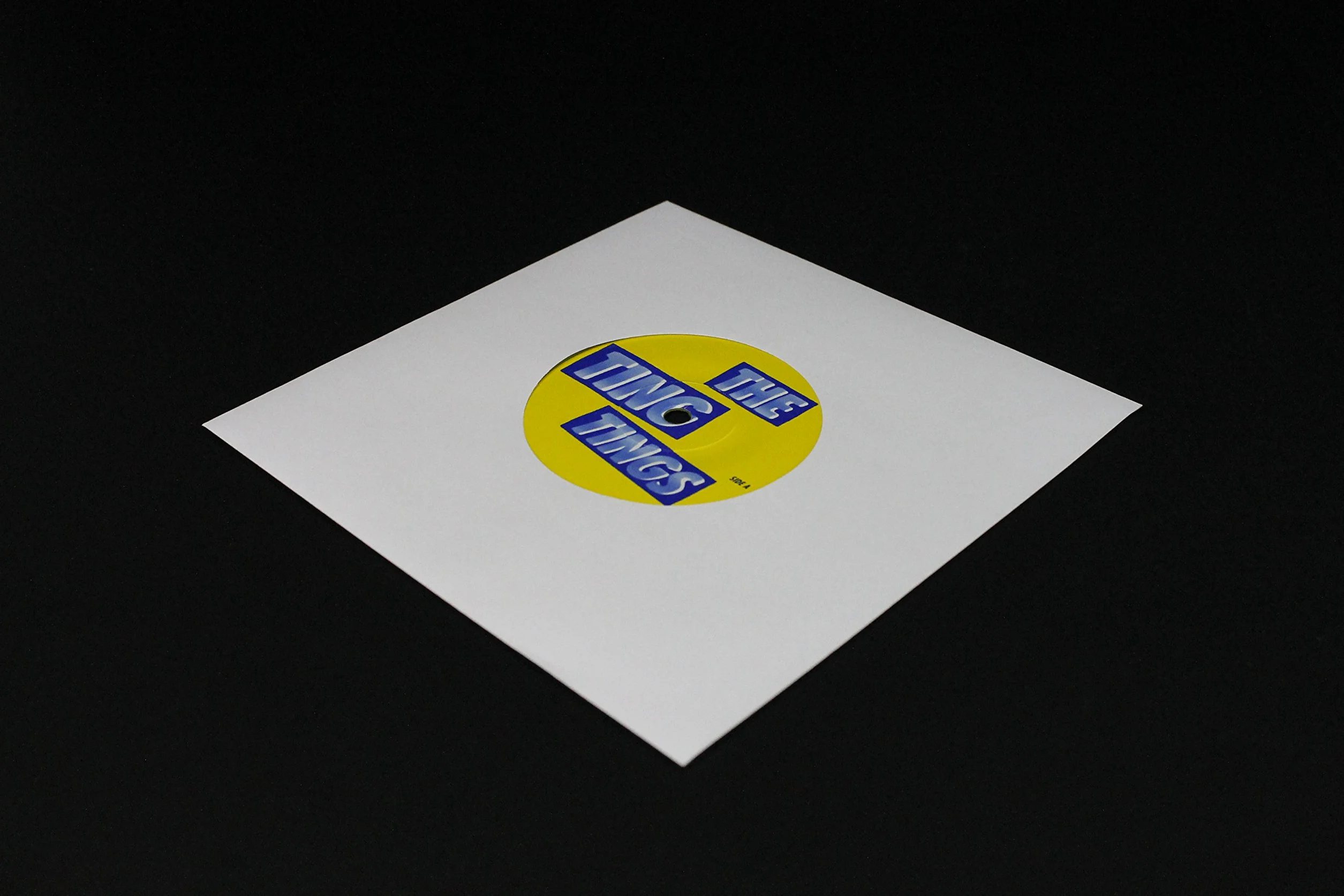 MC DAISON 100 BUSTE COPERTINE CUSTODIE in CARTA BIANCA SPESSA 60gr/m forata per dischi 45 giri rpm 7" per vinile diametro 18 cm